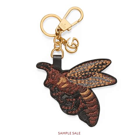 gucci bee keychain replica|gucci bag counterfeit logo.